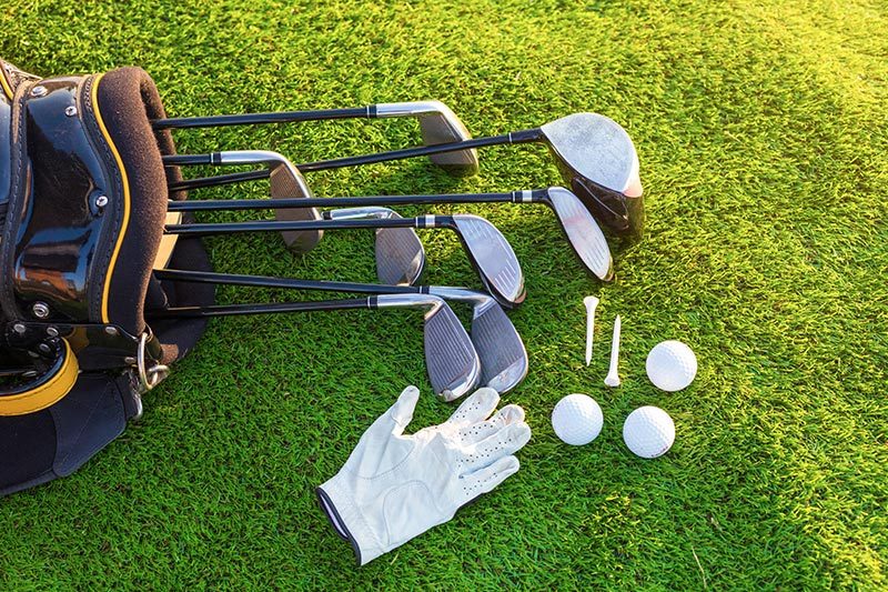 golf-clubs-on-a-green-in-a-55-community