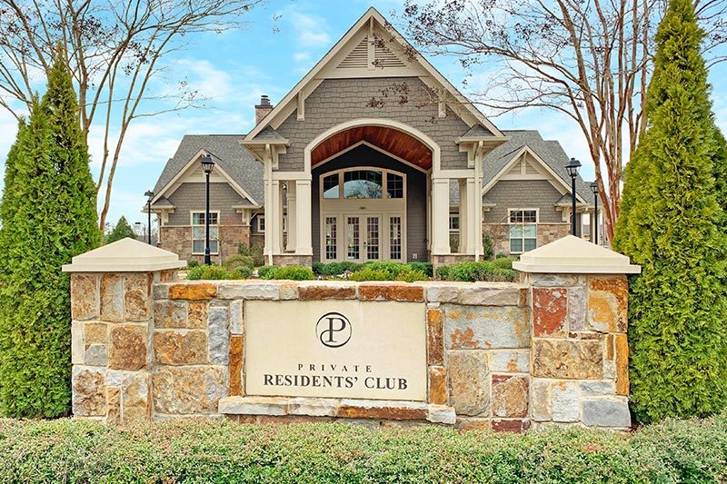 The welcome sign at the entrance of Highcliff at Palisades - The Gardens, a 55+ community in Charlotte, North Carolina.
