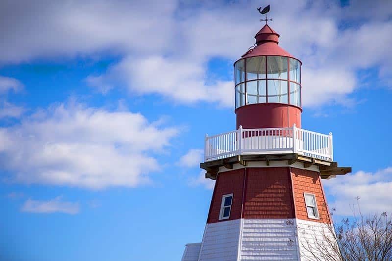 Clouds dotting the sky behind the lighthouse in Toms River, New Jersey.