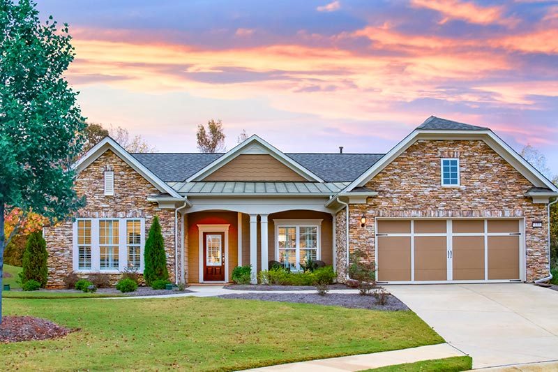 Exterior view of a model home at Sun City Peachtree, a 55+ community in Griffin, Georgia.