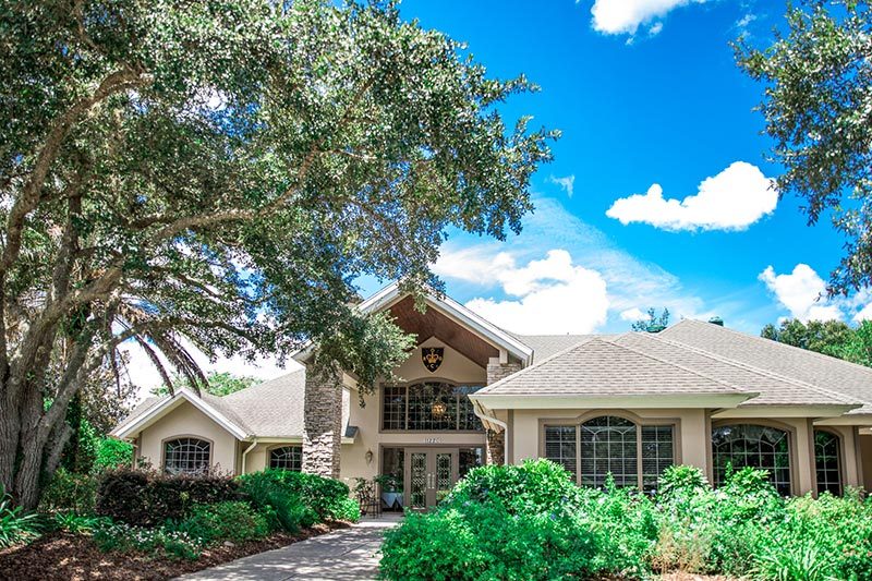 Greenery surrounding the clubhouse at Oak Run in Ocala, Florida