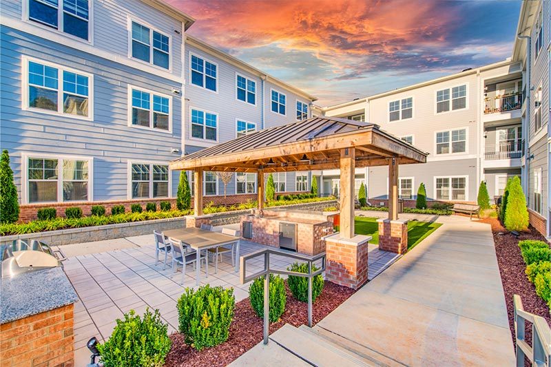 The outdoor barbecue area at Overture Centennial and Raleigh, North Carolina.