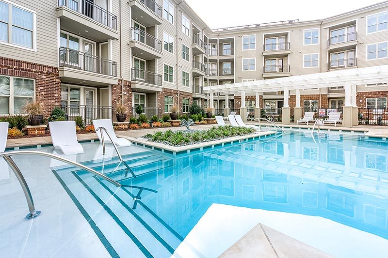 Lounge chairs in the outdoor pool at Overture Crabtree in Raleigh, North Carolina.