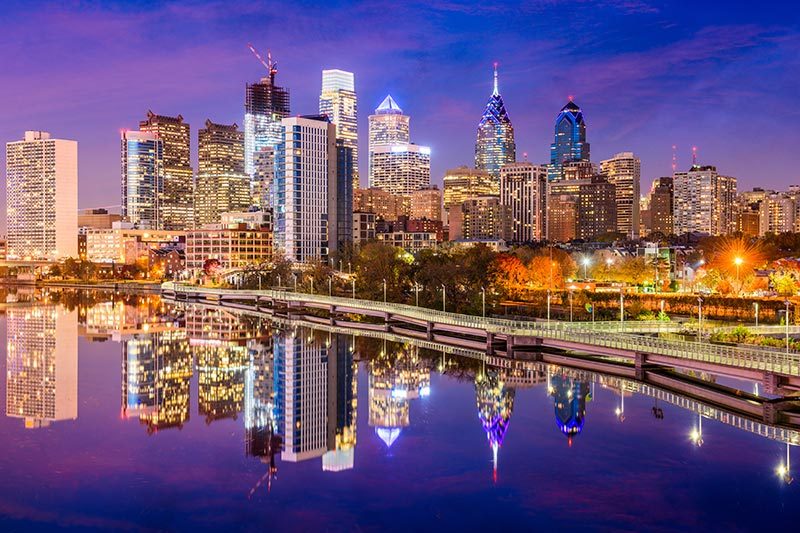 Twilight view of the Philadelphia skyline from across the Schuylkill River.