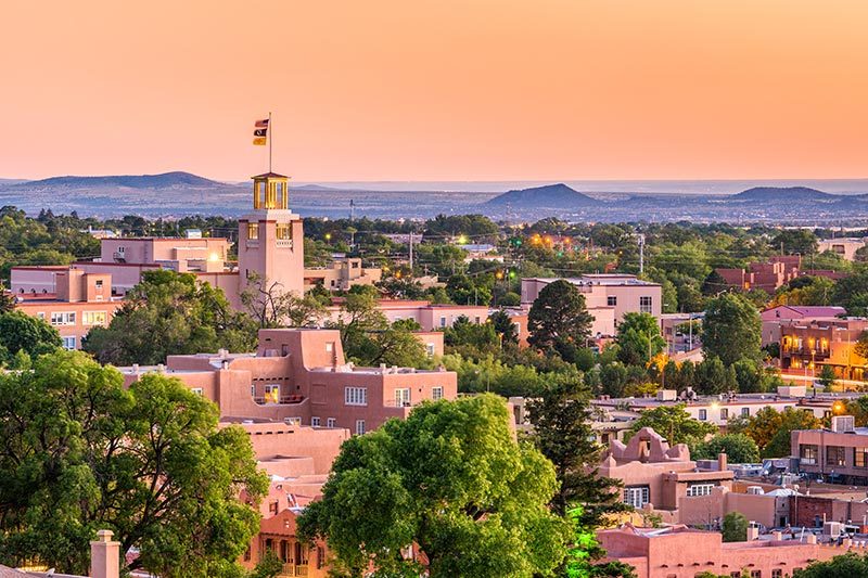 View of the skyline at dusk in Santa Fe, New Mexico.