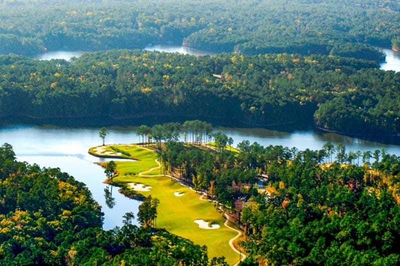 Aerial view of the forest and golf course surrounding Savannah Lakes Village in McCormick, South Carolina.