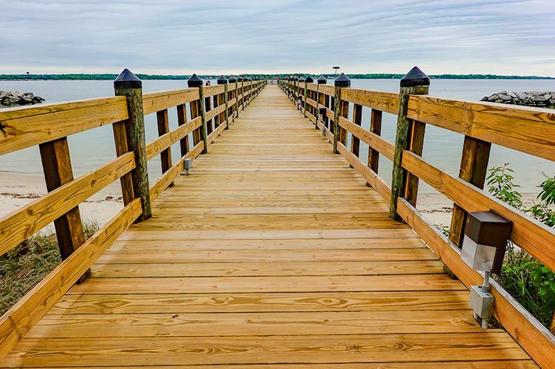 A wooden dock on the Patuxent River in Solomons, Maryland.