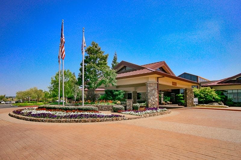 Exterior view of the clubhouse and entrance to Sun City Lincoln Hills in Lincoln, California.