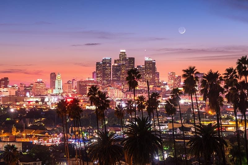 The lights of the Los Angeles skyline at night.