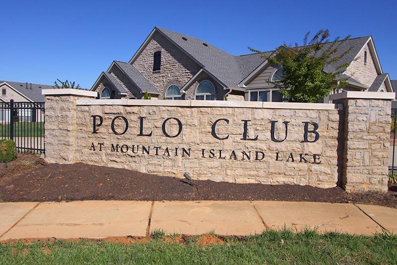 If you’re looking for a small-town feel, take a look at these 55+ communities in North Carolina. The entrance sign at the Polo Club at Mountain Island Lake, a 55+ community in Charlotte, North Carolina.
