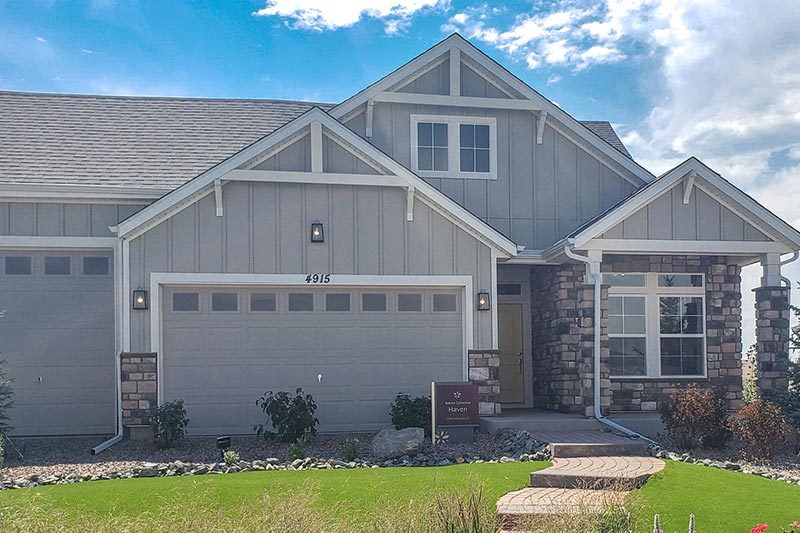 Exterior view of a model home at The Reserve at Green Valley Ranch in Aurora, Colorado.